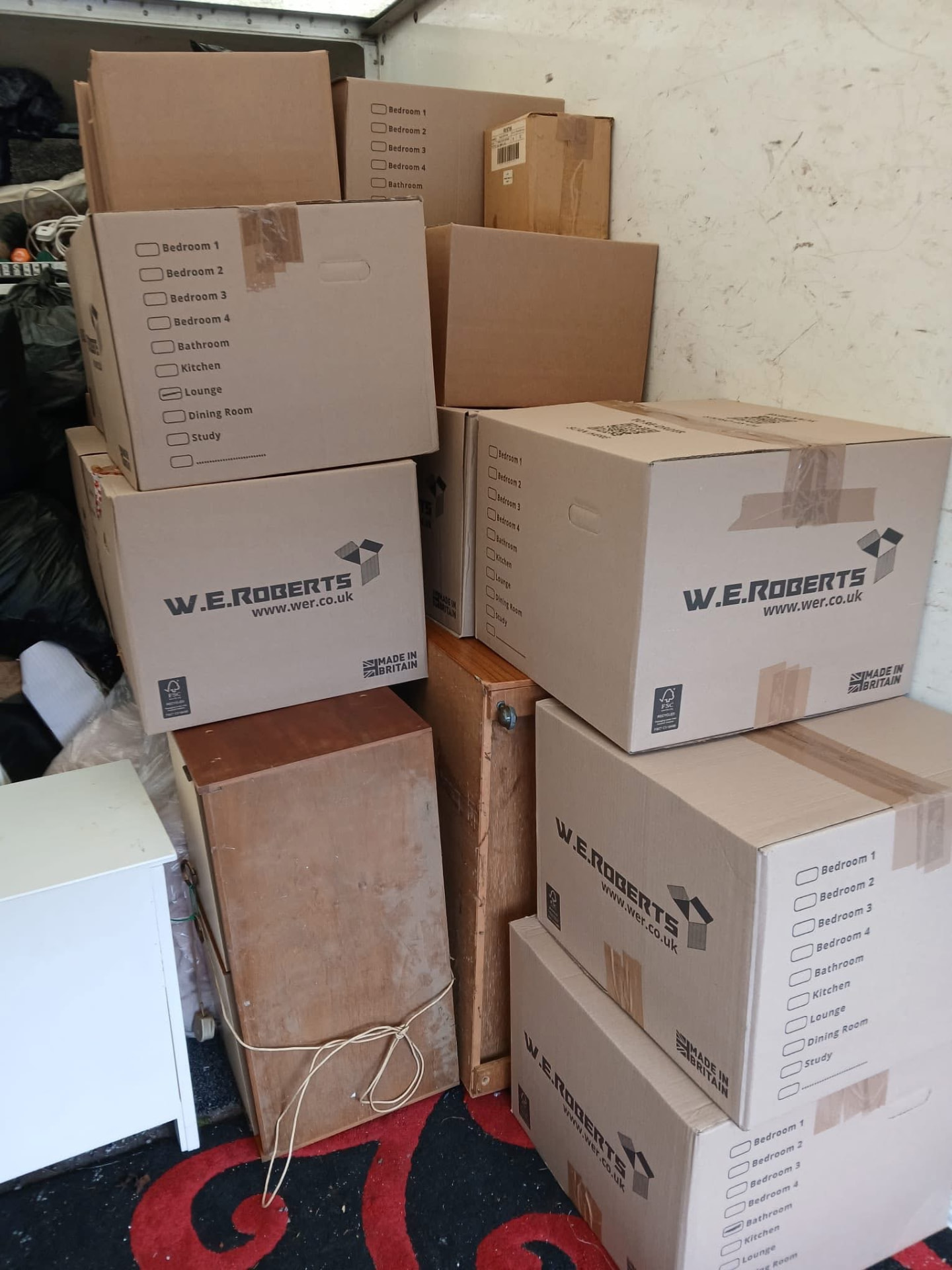 Furniture and boxes loaded in the Newys Removals van for a house move in Birmingham